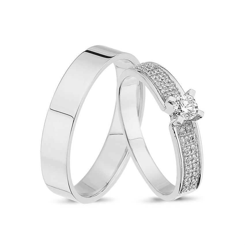 Unikke Nuran vielsesringe i 14 karat hvidguld med 1 x 0,20 ct og 32 x 0,005 ct diamanter